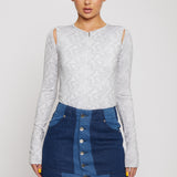 Jmojo patchwork denim mini skirt worn with grey long sleeve top full front view