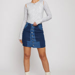 Jmojo high waist patchwork denim mini skirt front view model pose with white boots