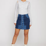Jmojo patchwork denim mini skirt standing full length front view two tone denim