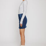 Jmojo patchwork denim mini skirt side view on model showing snap buttons