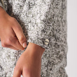 Jmojo printed sherpa denim jacket branded silver cuff button close up