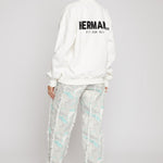 Jmojo printed straight leg jeans marble mint worn with white sweatshirt back view