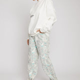 Jmojo printed straight leg jeans marble mint worn with white sweatshirt side view