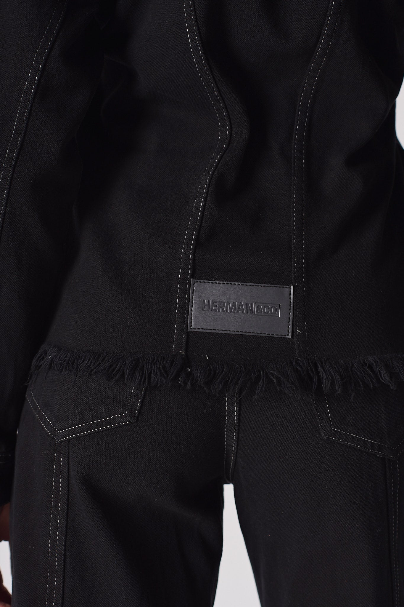 Jmojo tapered waist black denim jacket back logo patch detail close up