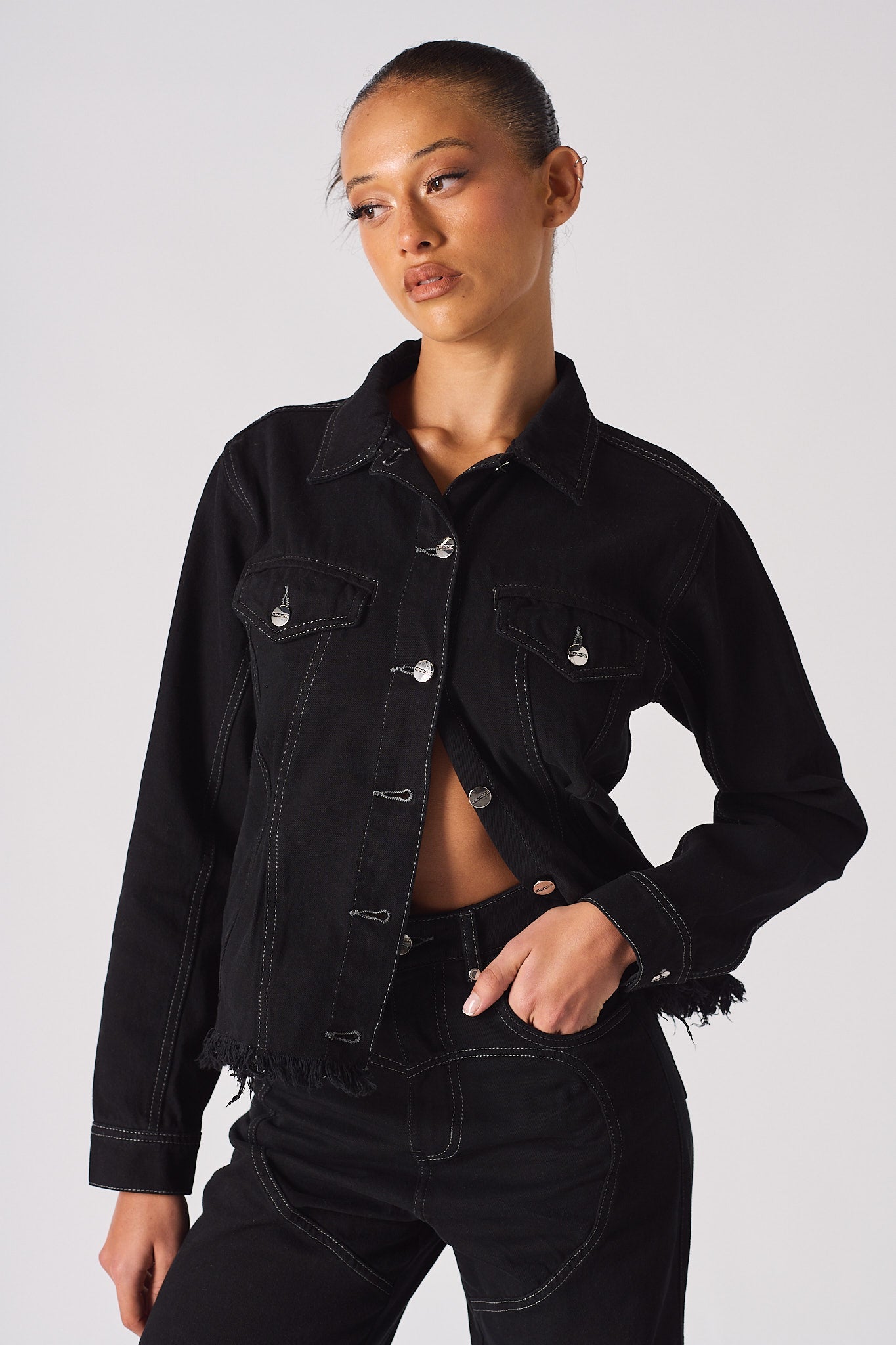 Jmojo tapered waist black denim jacket worn open model front view