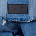 Jmojo two tone denim jacket Herman and Co vegan leather patch close up