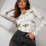 Jmojo white earth printed bodysuit low angle view
