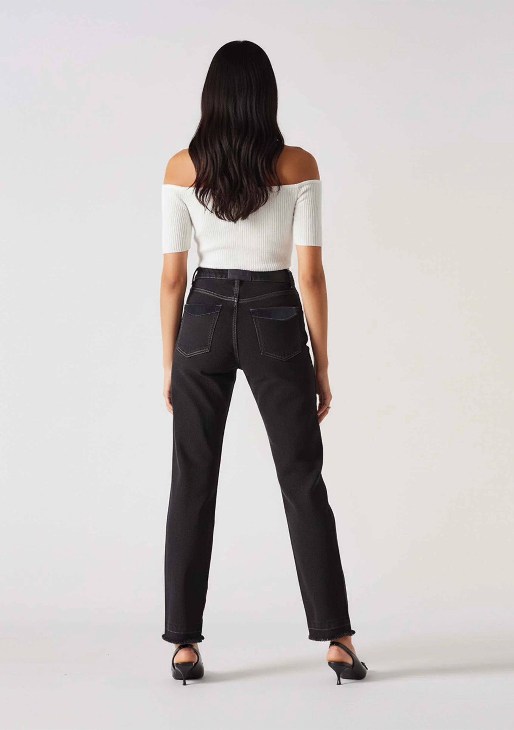 Full back view of Ladies Black Wash Popper Detail Jeans highlighting the fit