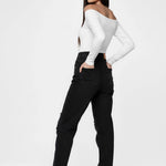 Back angled view of a model in Ladies Black Wash Straight Cut Denim