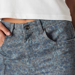 Close up of the front waist and button on Ladies Grey and Dark Blue Speckle Denim