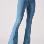 Side profile view of model wearing high-waisted light blue bootcut denim