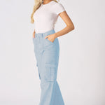 A side profile of the light blue cargo jeans for women highlighting the relaxed wide leg silhouette.