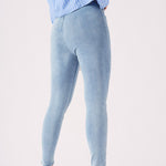 A side-back view of the light blue jeggings for women showing the secure fit and high-quality denim look.