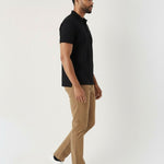 Side profile fit of mens light brown trousers