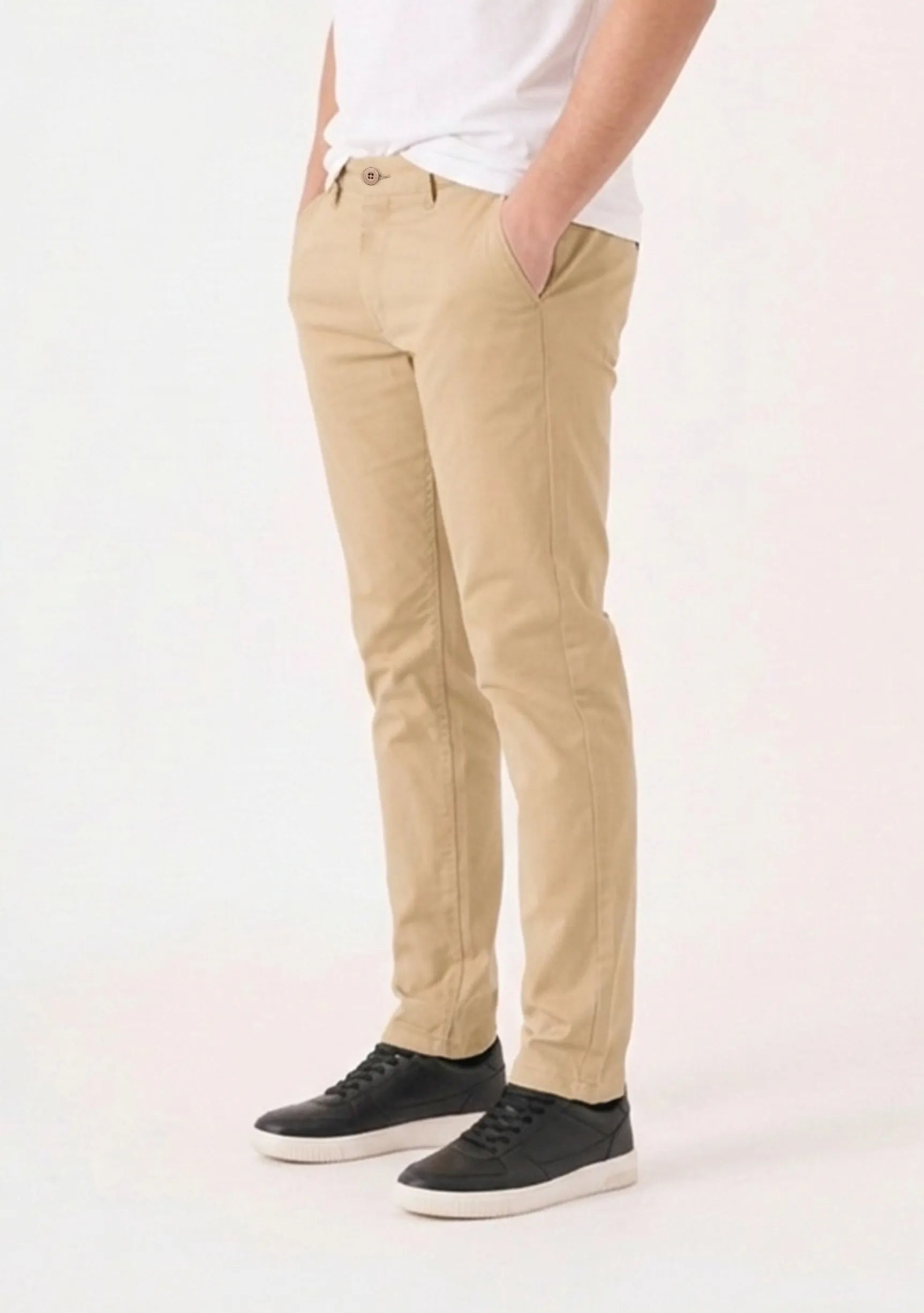 Close-up side view of mens beige chinos showcasing the casual fit and pocket details.