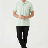 Side profile showcasing the flexibility and modern cut of mens black slim fit trousers.