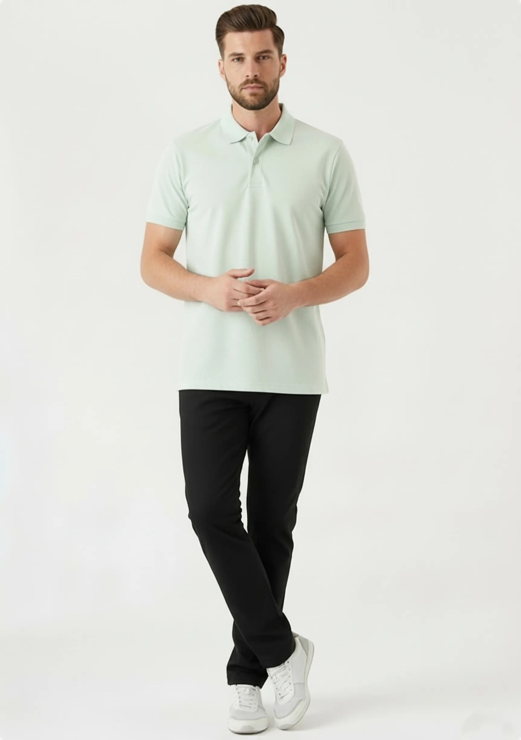 Side profile showcasing the flexibility and modern cut of mens black slim fit trousers.