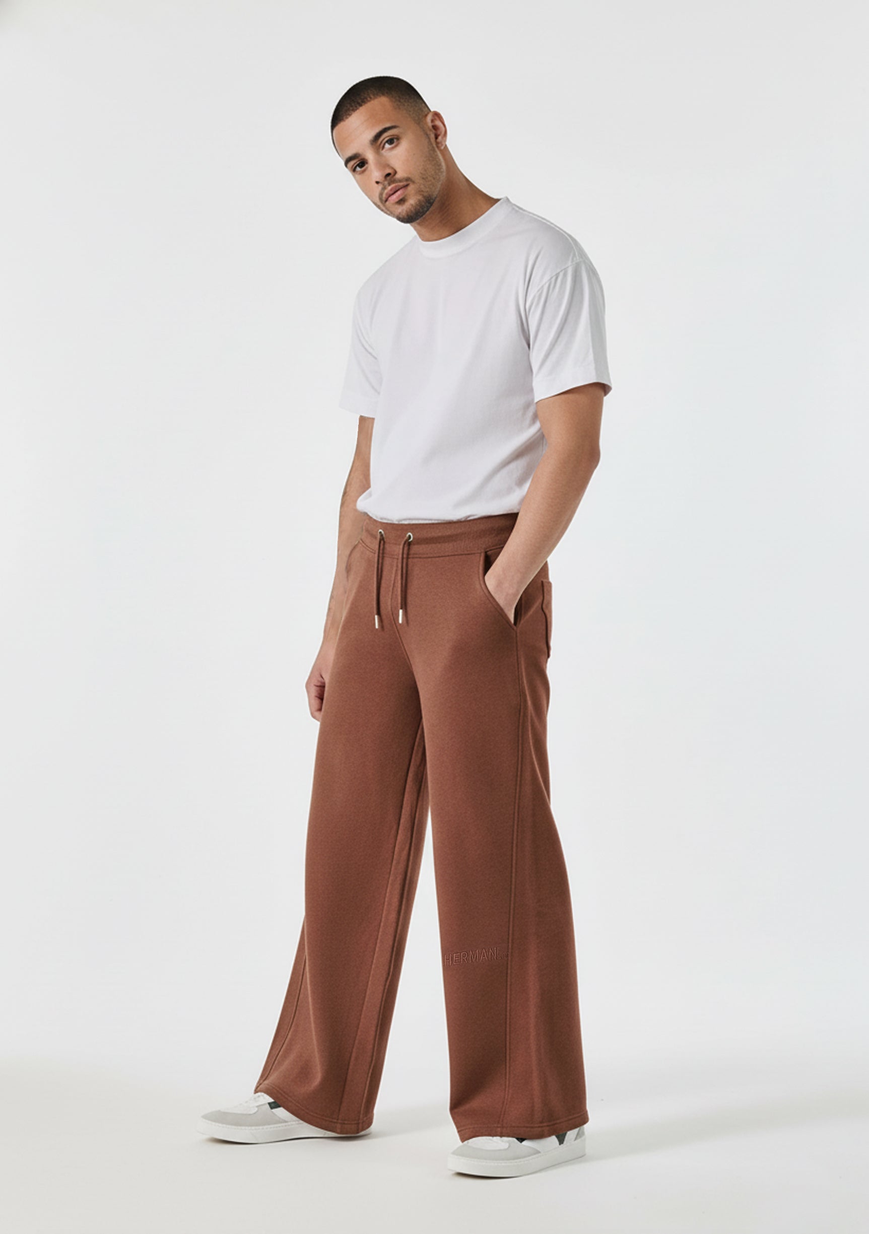 Mens brown wide leg joggers side profile