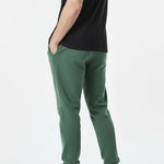 back angle view of mens dark green tapered joggers
