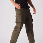 Rear view of the green cotton cargo pants showing the pocket placement and high-quality finish.