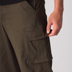 Close up view of the multiple functional 3D cargo pockets on the green twill fabric.
