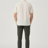 Full back shot of stylish mens olive trousers highlighting the modern slim fit silhouette.