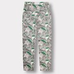 Back view of the men's printed denim jeans laid flat.