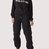 Full length shot of a woman in a premium oversized hoodie black.