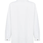 Oversized white shirt logo embroidery close up