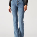 Light blue jeans worn by a person on a white background