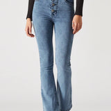 Light blue jeans worn by a person on a white background