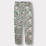 Front view of the printed jeans for men laid flat.