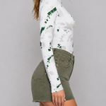 Printed mock neck bodysuit with thumbhole sleeves side view