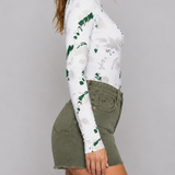 Printed mock neck bodysuit with thumbhole sleeves side view