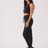 Side profile of womens relaxed pintuck jogger showing comfortable fit