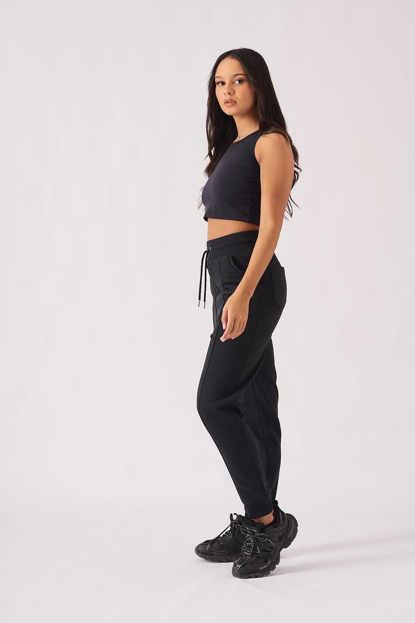 Side profile of womens relaxed pintuck jogger showing comfortable fit