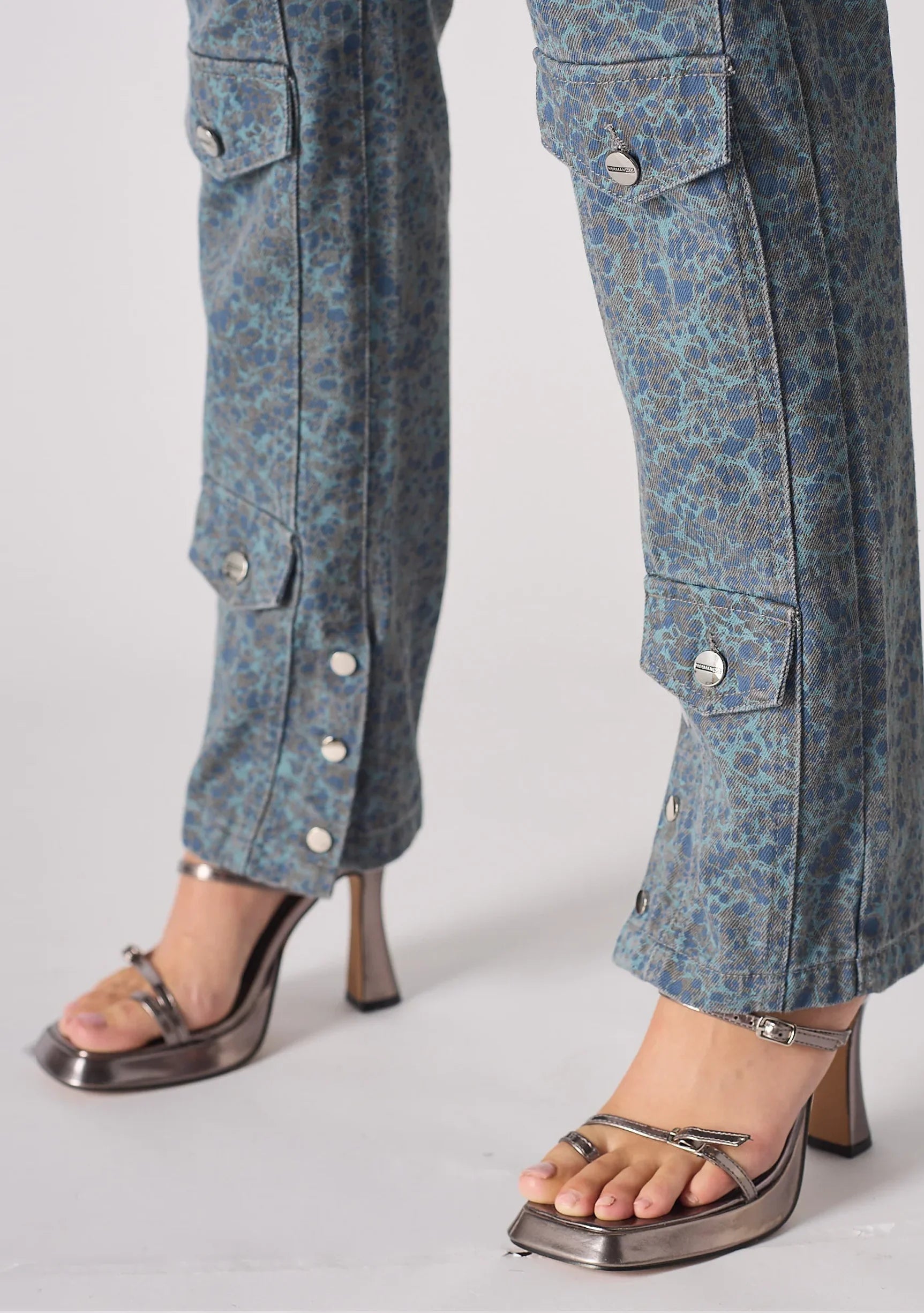 Close up of the ankle popper detail on Speckled Grey and Dark Blue Jeans for Women