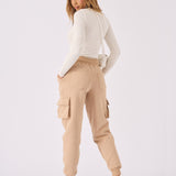 Detailed close up of the side cargo pocket on the stone joggers.