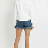 Back view of white denim trucker jacket for women showing clean design and regular fit