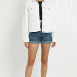 Full front view of white denim trucker jacket for women - classic collar, button front, chest pockets, regular fit