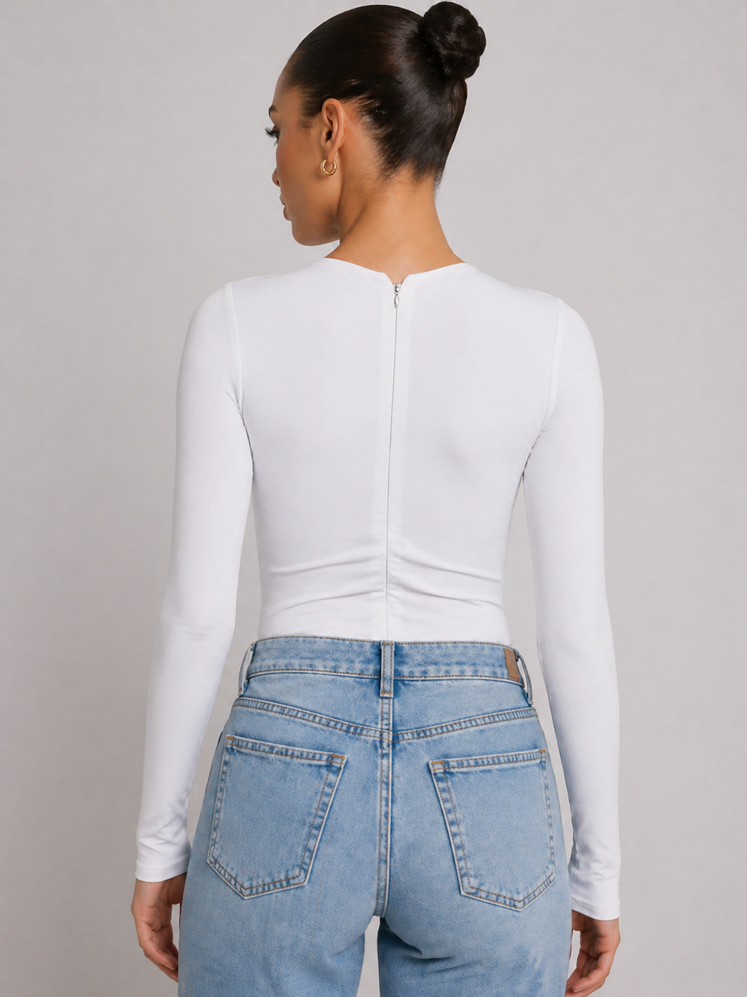 White long sleeve bodysuit showing invisible zip back closure