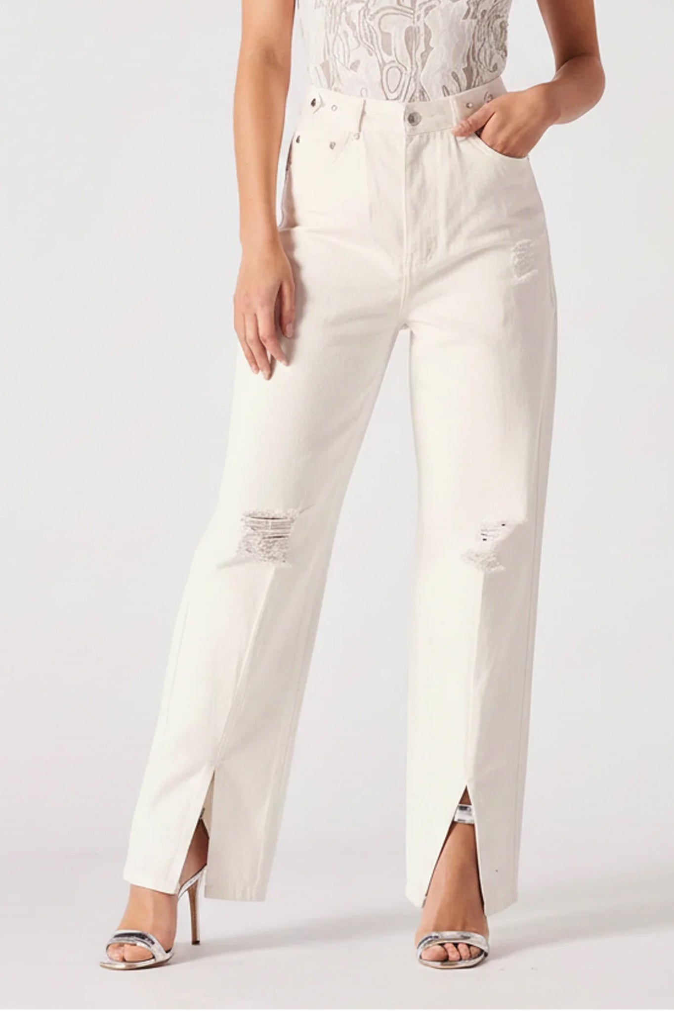 White pants with a high slit on a white background