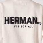 Close up of the black printed text on the back of a white sweatshirt for women