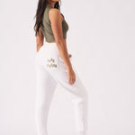 Rear view showing the flattering fit of the white tapered jogger womens.