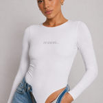 White thumbhole shaping bodysuit front fit detail