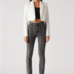 Front view of women's acid grey bootcut jeans featuring vertical center seams
