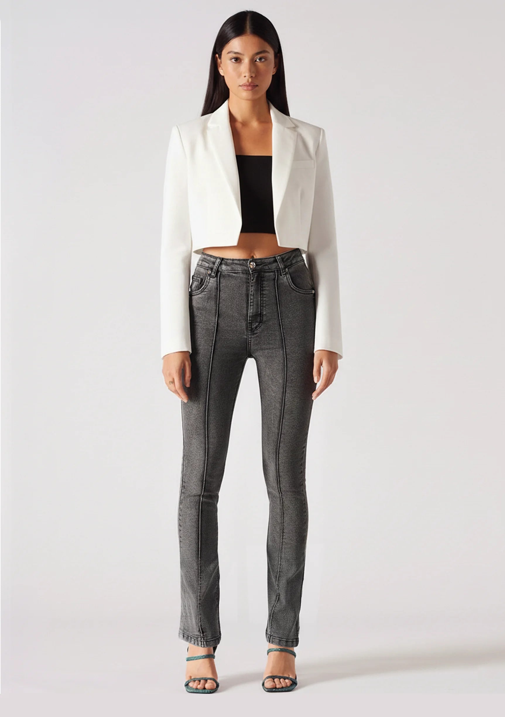 Front view of women's acid grey bootcut jeans featuring vertical center seams