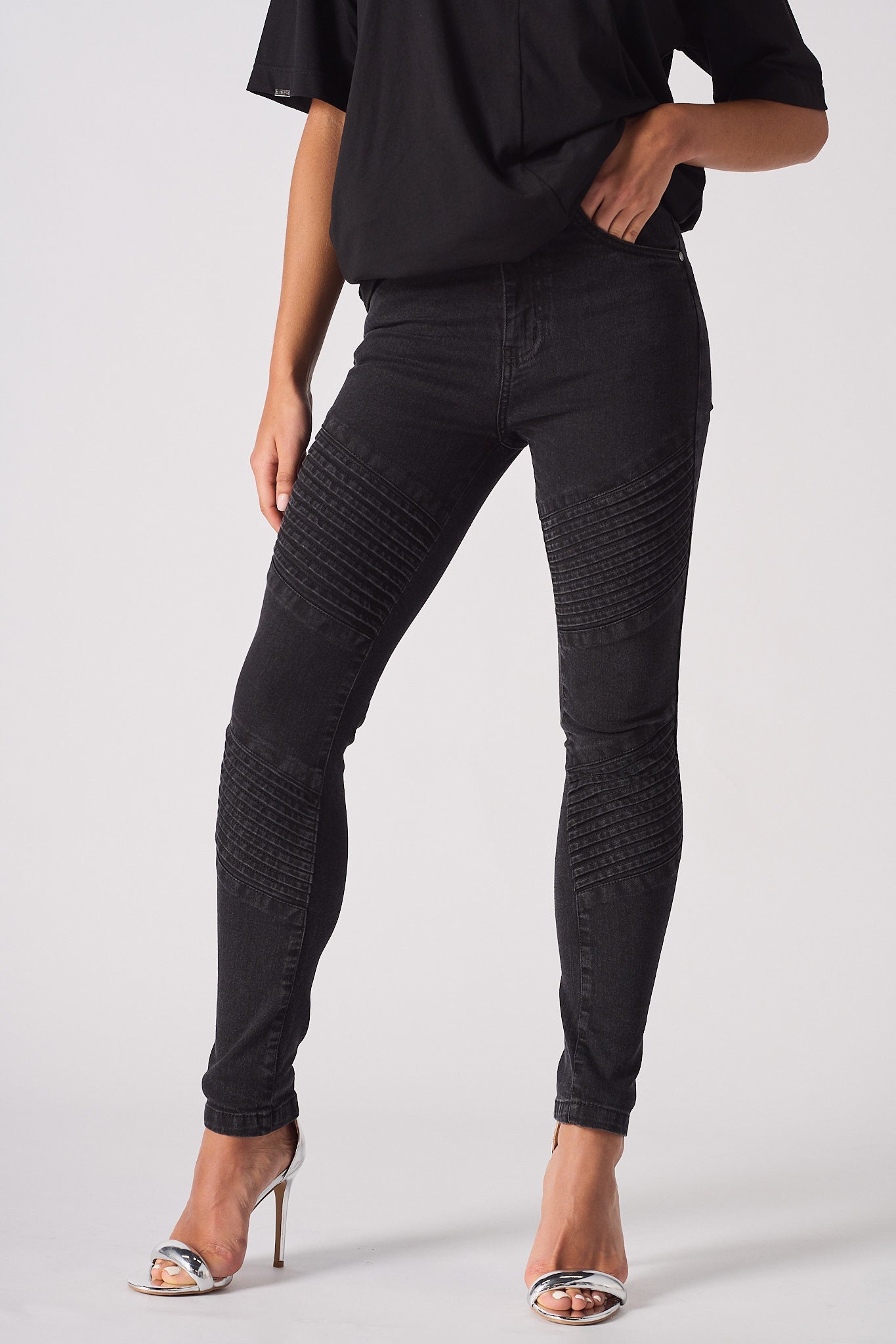 womens black skinny biker jeans front view ribbed knee panel detail