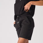 womens black relaxed sweat shorts side view