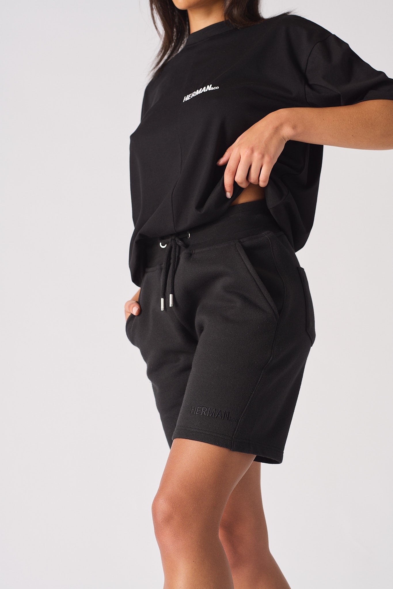 womens black relaxed sweat shorts side view